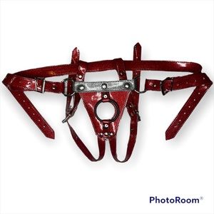 Strap on harness in glitter red with dark glitter grey accent. One size. NWOT.
